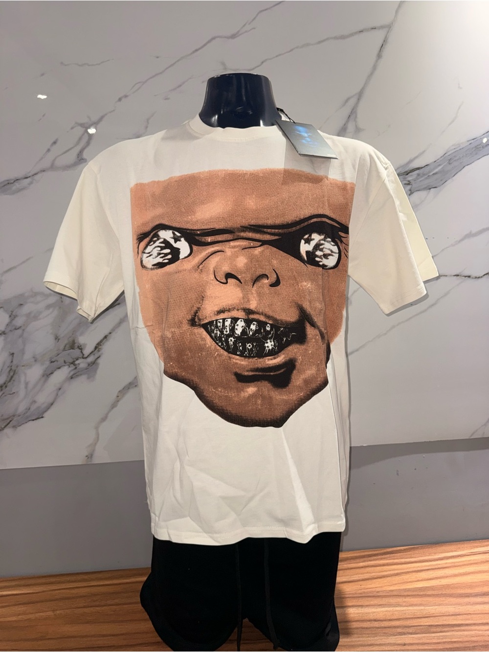Hellstar Cream Short-Sleeve Graphic Tee with Brown Face Print